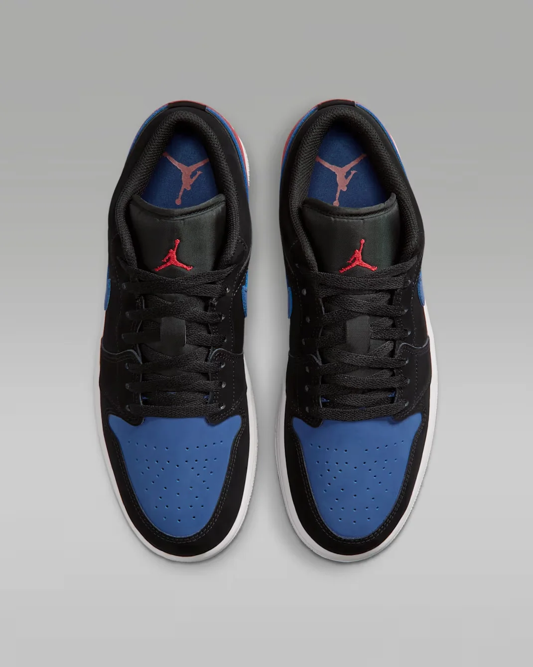 Top-down view of the Air Jordan 1 Low Black True Blue Varsity Red Summit White with blue toe boxes and black laces.